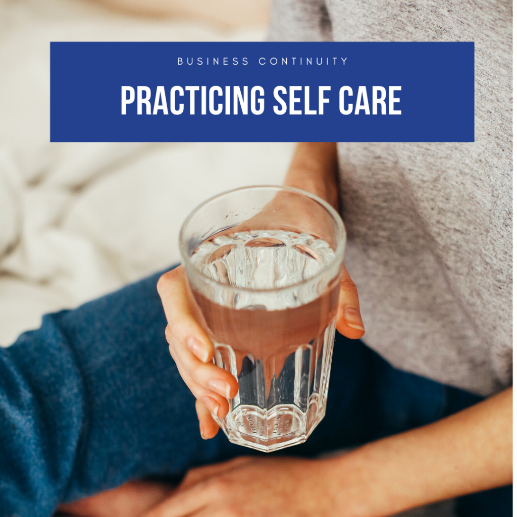 Self Care - person holding glass of water